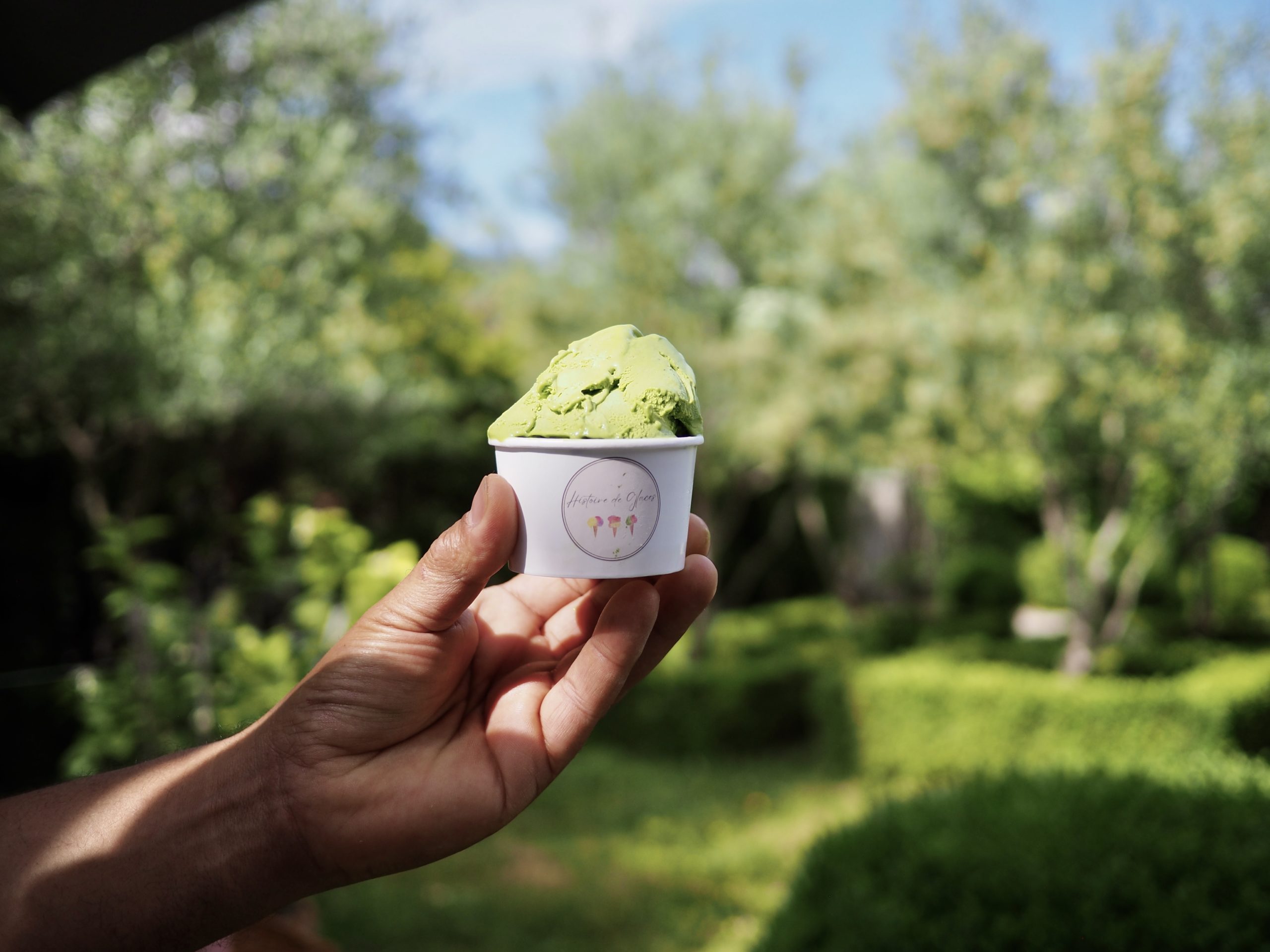 person holding ice cream cone